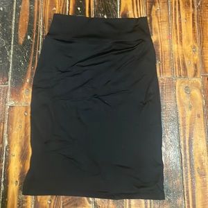 Selling black mid rise skirt